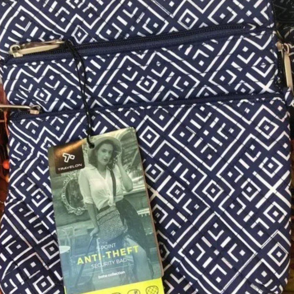 Travelon Anti-Theft Crossbody blue and white tile with theft proof zipper locks